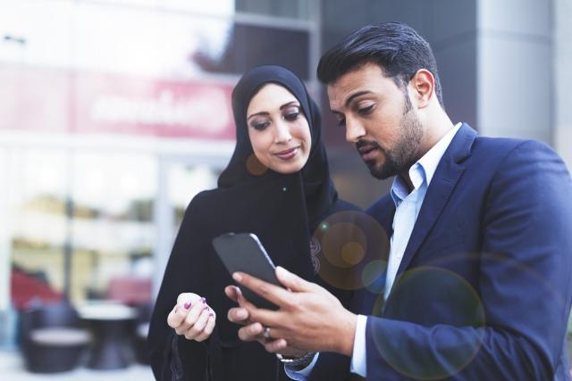 Two business people discuss the WFG business