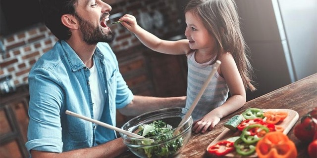 Financially secured family enjoying dinner.