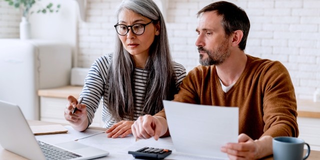 Couple looking over paperwork